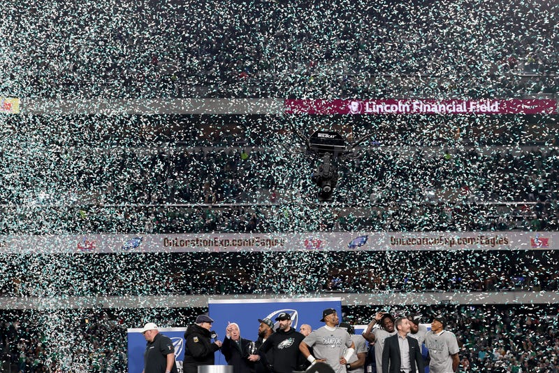 Philadelphia Eagles owner Jeffrey Lurie, head coach Nick Sirianni, general manager Howie Roseman, and players celebrate after defeating the Washington Commanders 55-23 to win the NFC championship game at Lincoln Financial Field on Jan. 26, 2025, in Philadelphia, Pennsylvania.