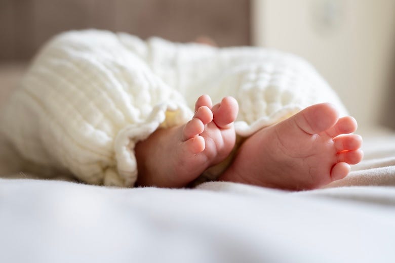 Feet of a newborn baby