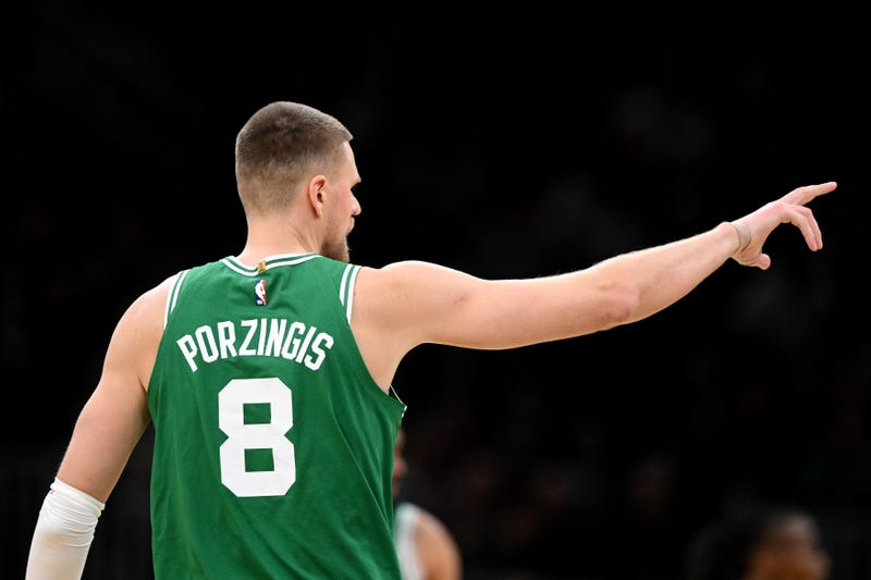 Kristaps Porzingis #8 of the Boston Celtics reacts after making a three-point basket against the Chicago Bulls during the third quarter at the TD Garden on January 29, 2025 in Boston, Massachusetts.