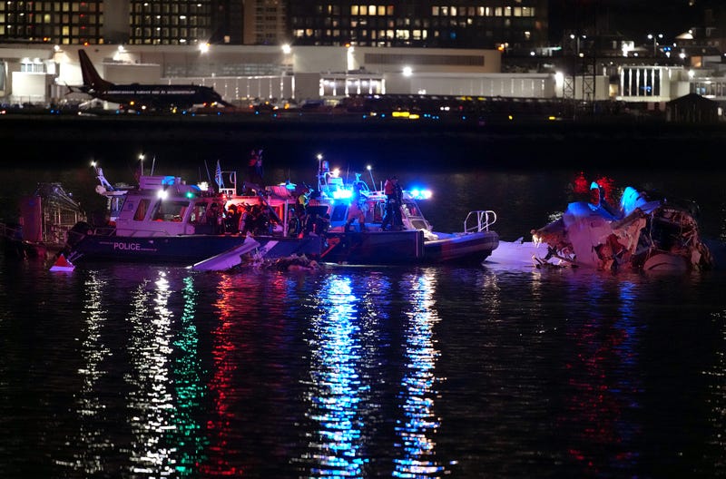 Emergency units respond after a passenger aircraft collided with a helicopter in the Potomac River near Ronald Reagan Washington Airport on January 30, 2025 in Arlington, Virginia