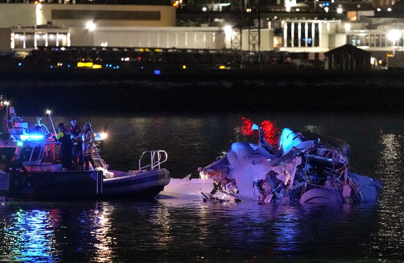 ARLINGTON, VIRGINIA - JANUARY 30: (EDITORS NOTE: Image contains graphic content) Emergency units respond after a passenger aircraft collided with a helicopter in the Potomac River near Ronald Reagan Washington Airport on January 30, 2025 in Arlington, Virginia. An American Airlines flight from Wichita, Kansas collided with an Army helicopter while approaching Rona