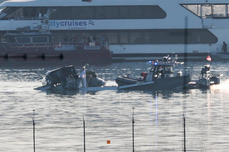 Emergency response units search the crash site of the American Airlines plane on the Potomac River after the plane crashed on approach to Reagan National Airport on January 30, 2025 in Arlington, Virginia