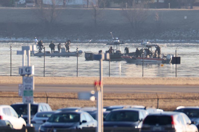 Emergency response units search the crash site of the American Airlines plane on the Potomac River after the plane crashed last night on approach to Reagan National Airport on Jan. 30, 2025, in Arlington, Virginia.