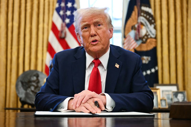 Donald Trump speaks to the press