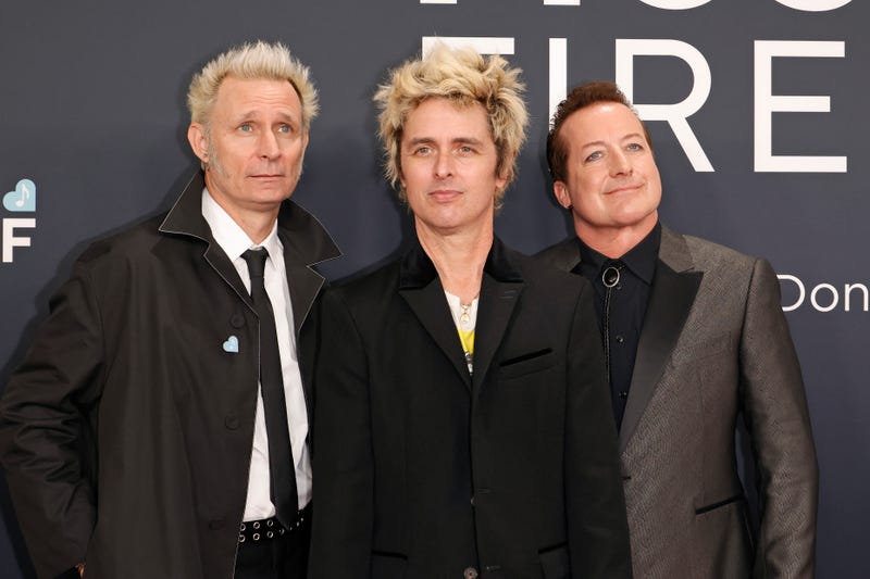 (L-R) Mike Dirnt, Billie Joe Armstrong, and Tré Cool of Green Day attend the 67th GRAMMY Awards on February 02, 2025 in Los Angeles, California.