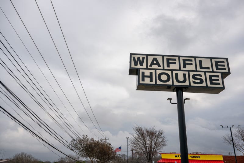 A Waffle House sign is displayed outside of the storefront on Feb. 5, 2025 in Austin, Texas. Waffle House has announced that it will be adding a 50-cent surcharge to all egg products because of soaring egg prices caused by the bird flu. The average price for a dozen eggs in the U.S. has increased approximately 50% in the last year.