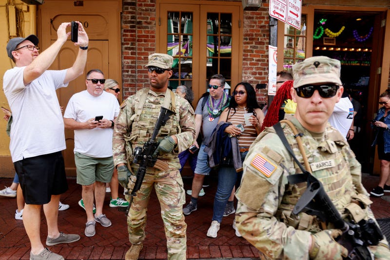  NEW ORLEANS, LOUISIANA - FEBRUARY 8: Members of the National Guard patrol in the French Quarter along Bourbon Street on February 8, 2025 in New Orleans, Louisiana. Security has increased around New Orleans as the National Guard and several other law enforcement agencies have been deployed ahead of Super Bowl LIX following a New Year’s Day terror attack on Bourbon Street that left 14 people dead. 