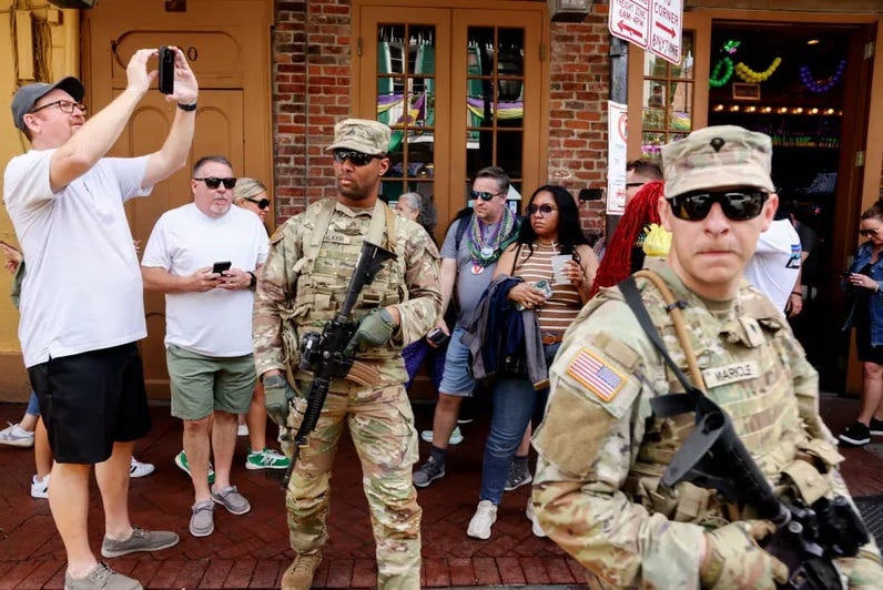 NEW ORLEANS, LOUISIANA - FEBRUARY 8: Members of the National Guard patrol in the French Quarter along Bourbon Street on February 8, 2025 in New Orleans, Louisiana. Security has increased around New Orleans as the National Guard and several other law enforcement agencies have been deployed ahead of Super Bowl LIX following a New Year’s Day terror attack on Bourbon Street that left 14 people dead.