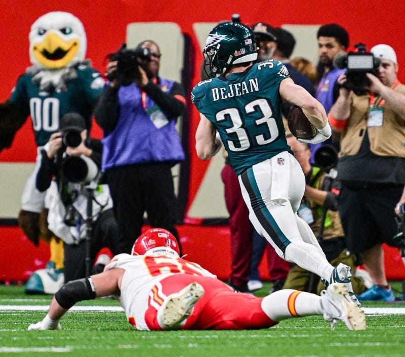 Kansas City Chiefs guard Mike Caliendo falls flat while trying to stop Philadelphia Eagles cornerback Cooper DeJean from running in an interception for a touchdown in the second quarter of Super Bowl LIX.