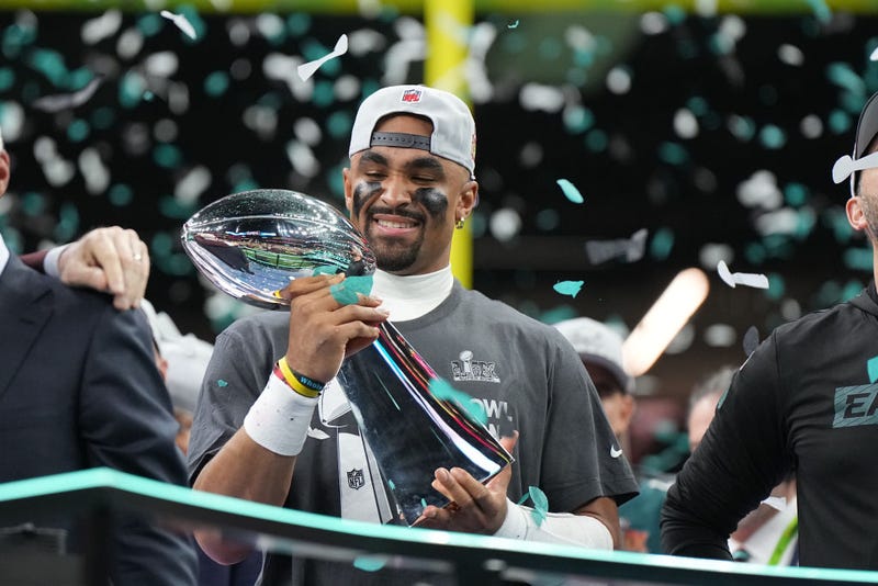 Jalen Hurts holds the Vince Lombardi trophy following victory against the Kansas City Chiefs.