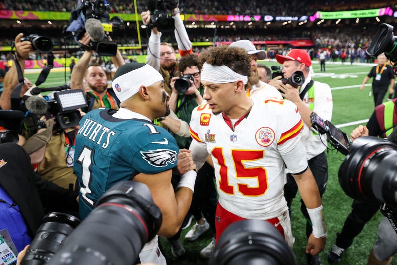 Jalen Hurts #1 of the Philadelphia Eagles and Patrick Mahomes #15 of the Kansas City Chiefs embrace after Super Bowl LIX at Caesars Superdome on February 09, 2025 in New Orleans, Louisiana. 