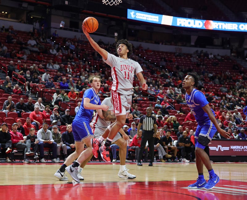 Dedan Thomas Jr. #11 of the UNLV Rebels shoots a layup against the Air Force Falcons in the first half of their game at the Thomas & Mack Center on February 11, 2025 in Las Vegas, Nevada.