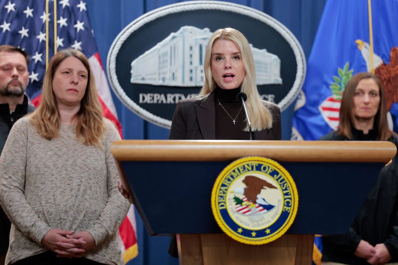  U.S. Attorney General Pam Bondi speaks during a news conference at the Department of Justice Building on February 12, 2025 in Washington, DC. Bondi held the news conference to announce charges against the state of New York for failure to enforce federal immigration laws. Bondi was joined by Tammy Nobles (L) whose 20-year-old daughter was murdered by an El Salvadoran who was allegedly in the MS-13 gang. 