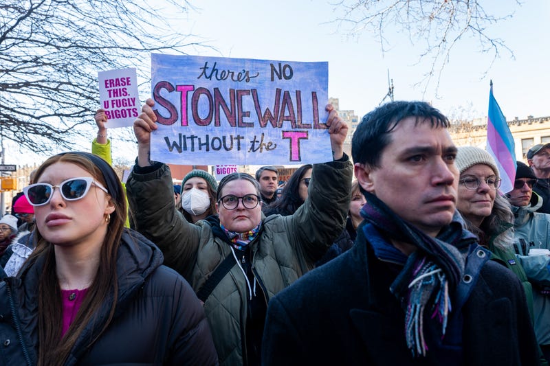 People protest the removal of the word “transgender” from the Stonewall National Monument website during a rally outside of The Stonewall Inn on February 14, 2025. 