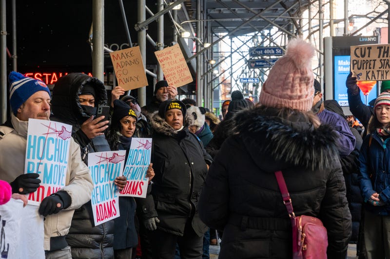 Protesters gather in front of Gov. Kathy Hochul's Manhattan offices to demand she fire Mayor Eric Adams on February 21, 2025