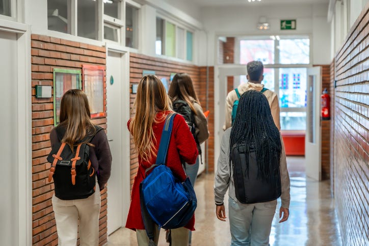 teens in hallway at school