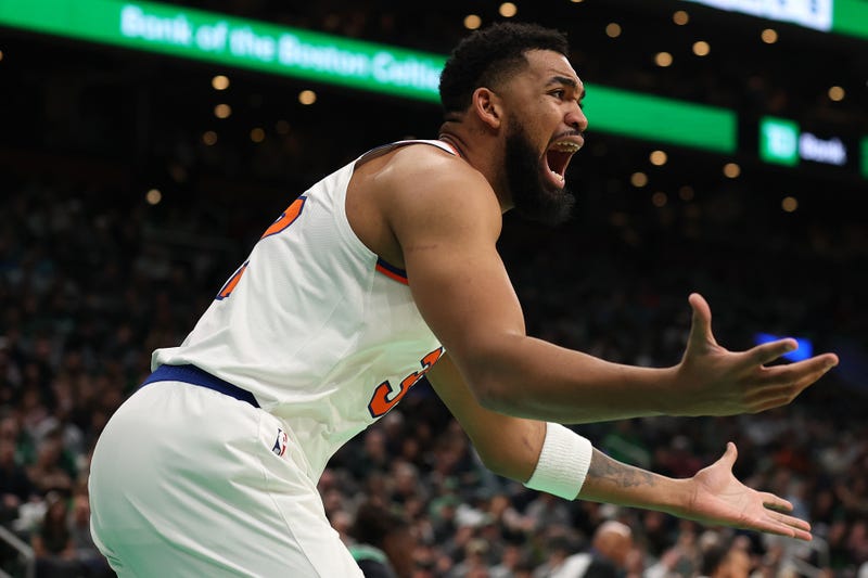 Karl-Anthony Towns #32 of the New York Knicks reacts to the lack of a foul called in his favor during the first quarter against the Boston Celtics at TD Garden on February 23, 2025 in Boston, Massachusetts.