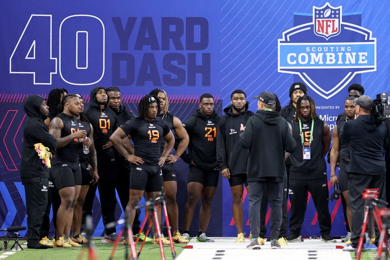 Ashton Jeanty #RB15 of Boise State looks on with others during the NFL Scouting Combine at Lucas Oil Stadium on March 01, 2025 in Indianapolis, Indiana. 