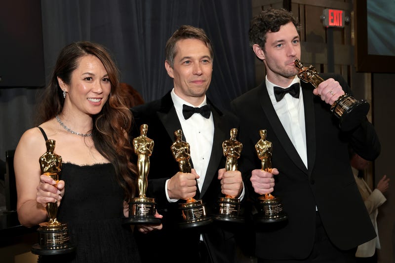 Samantha Quan, Sean Baker and Alex Coco, winners of the Best Picture for “Anora"
