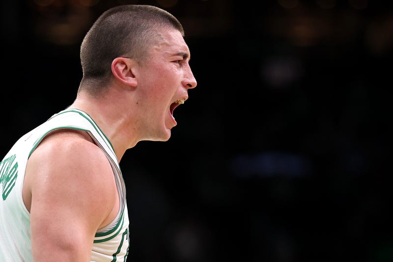 Payton Pritchard #11 of the Boston Celtics celebrates after scoring against the Portland Trail Blazers during the second quarter at TD Garden on March 05, 2025 in Boston, Massachusetts.