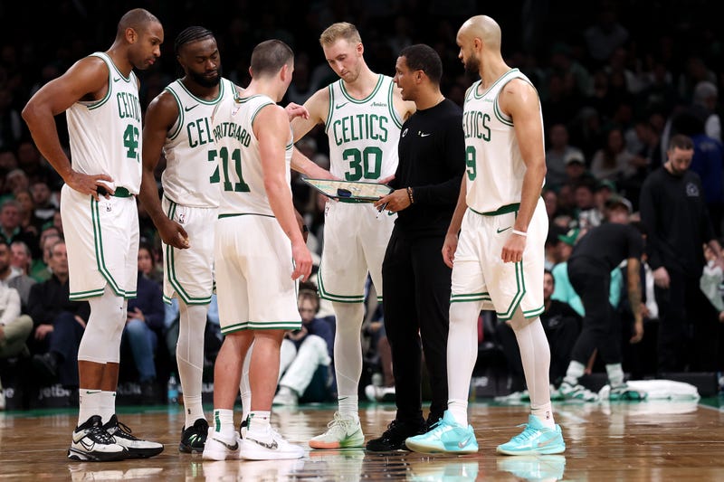 Boston Celtics head coach Joe Mazzulla stands in a huddle with Al Horford #42, Jaylen Brown #7, Payton Pritchard #11, Sam Hauser #30 and Derrick White #9 during the second half of the game against the Portland Trail Blazers at TD Garden on March 05, 2025 in Boston, Massachusetts.