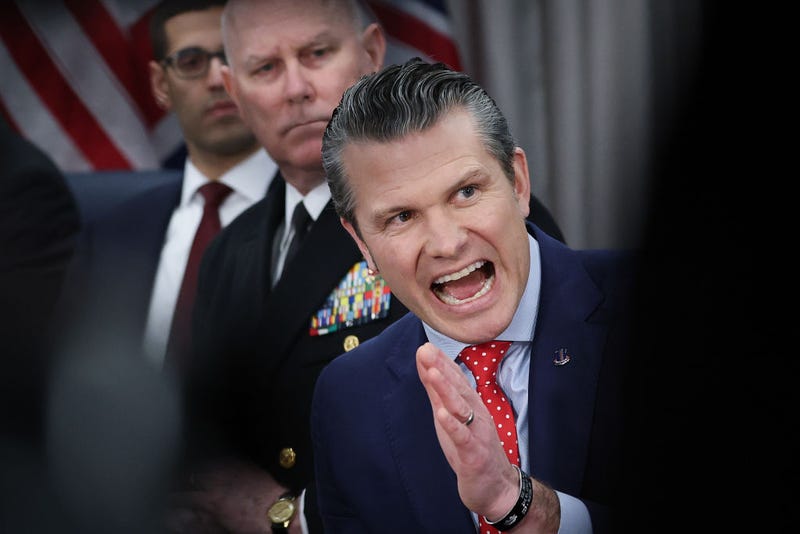 Secretary of Defense Pete Hegseth answers a reporter's question while meeting with UK Defense Secretary John Healey at the Pentagon with members of their respective teams on March 6, 2025