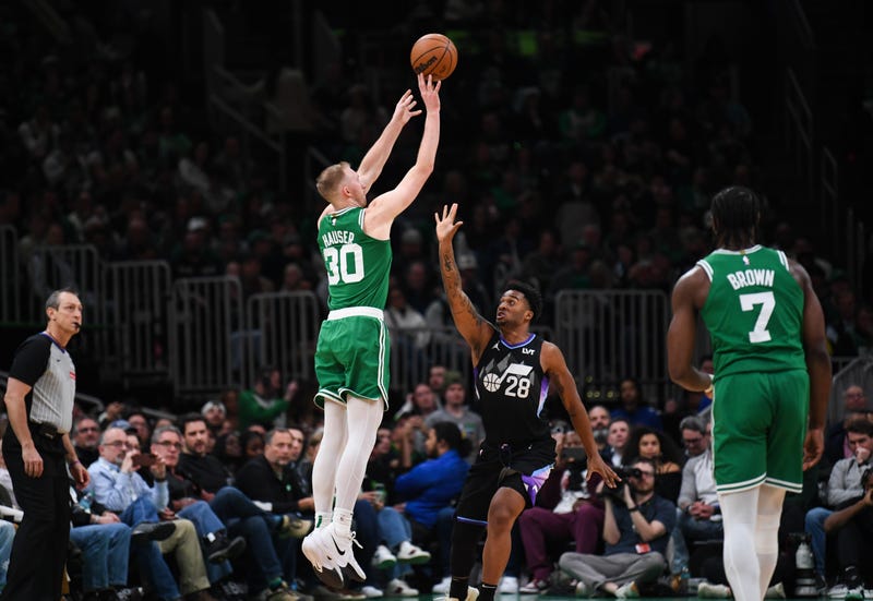Sam Hauser #30 of the Boston Celtics shoots the ball against Brice Sensabaugh #28 of the Utah Jazz during the second half at TD Garden on March 10, 2025 in Boston, Massachusetts.