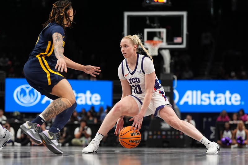 Hailey Van Lith #10 of the TCU Horned Frogs dribbles against West Virginia Mountaineers during the first half in the semi-final round of the women's Big 12 Championship at T-Mobile Center on March 8, 2025, in Kansas City, Missouri.