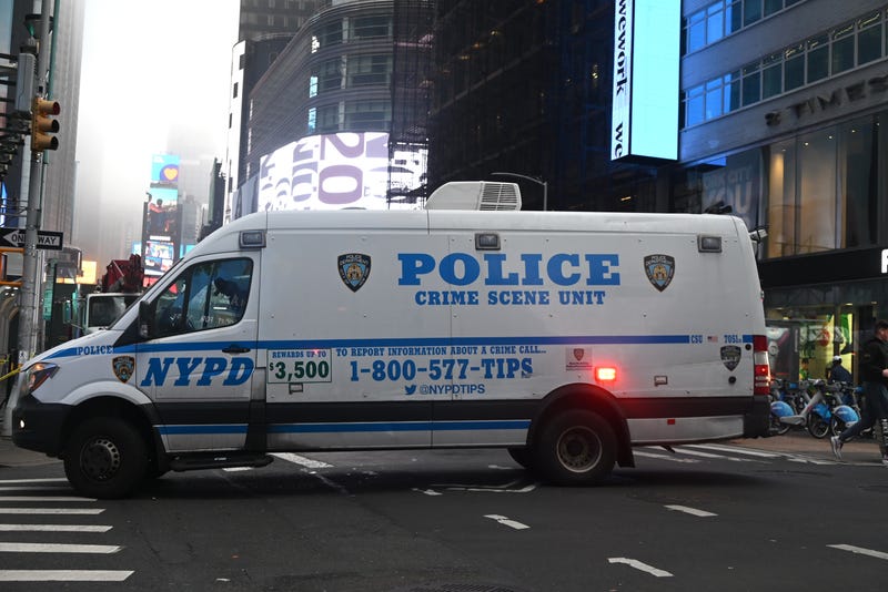 Police were still searching for at least two suspects in Friday night's attack on two NYPD officers