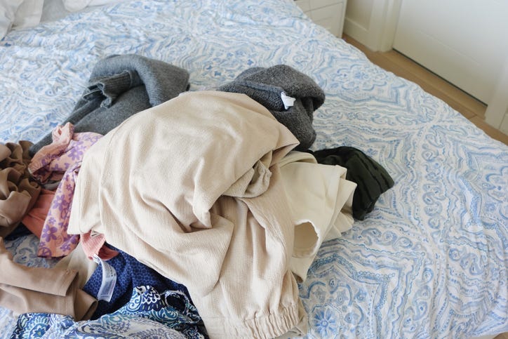Laundry Pile On Bed