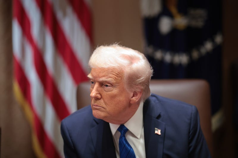 WASHINGTON, DC - MARCH 25: U.S. President Donald Trump listens to a reporter's question during an Ambassador Meeting in the Cabinet Room of the White House on March 25, 2025 in Washington, DC. During the meeting, Trump answered questions from reporters on the news that Jeffrey Goldberg, the editor-in-chief of The Atlantic magazine, was accidentally added to a Signal group chat of top administration officials, where highly sensitive national security information was discussed. (Photo by Win McNamee/Getty Images)