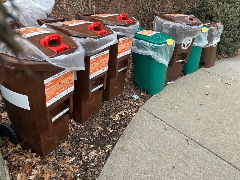 Group of compost bins outside apartment building in residential area of Queens, New York.