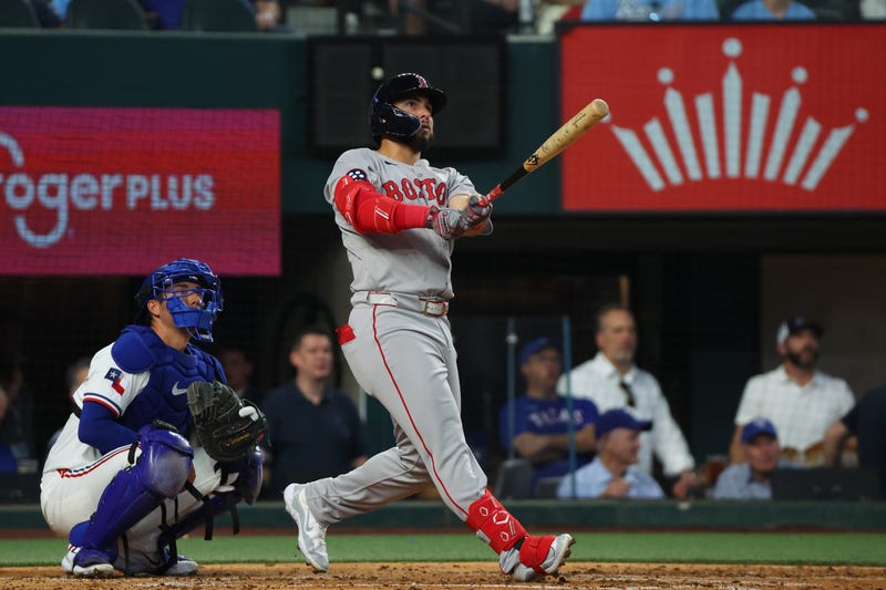 Wilyer Abreu #52 of the Boston Red Sox reacts after hitting a home run during the fifth inning against the Texas Rangers on Opening Day at Globe Life Field on March 27, 2025 in Arlington, Texas.