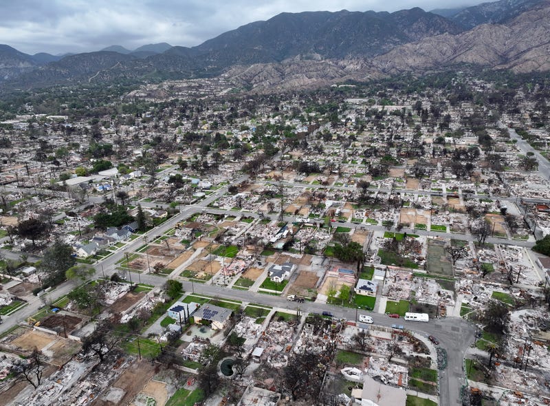 ALTADENA, CALIFORNIA - MARCH 28: An aerial view shows homes destroyed in the Eaton Fire along with lots cleared of debris on March 28, 2025 in Altadena, California. The U.S. Army Corps of Engineers estimates that they have cleared debris from 490 homes destroyed in the Eaton and Palisades Fires so far. Some homeowners are opting to have their lots cleared by private contractors.
