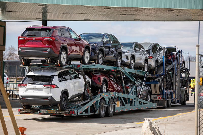A car hauler truck gasses up at a duty-free station before crossing the Ambassador into the United States at Detroit