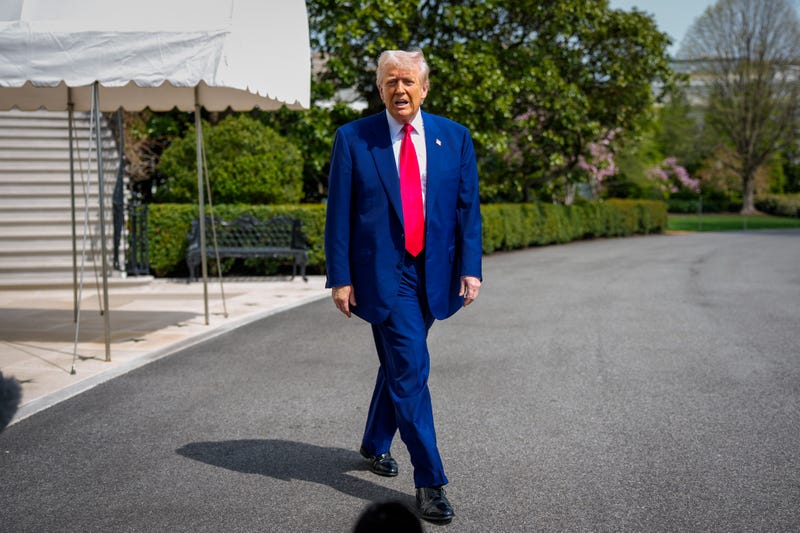 President Donald Trump speaks to members of the media before boarding Marine One on the South Lawn of the White House on April 3, 2025