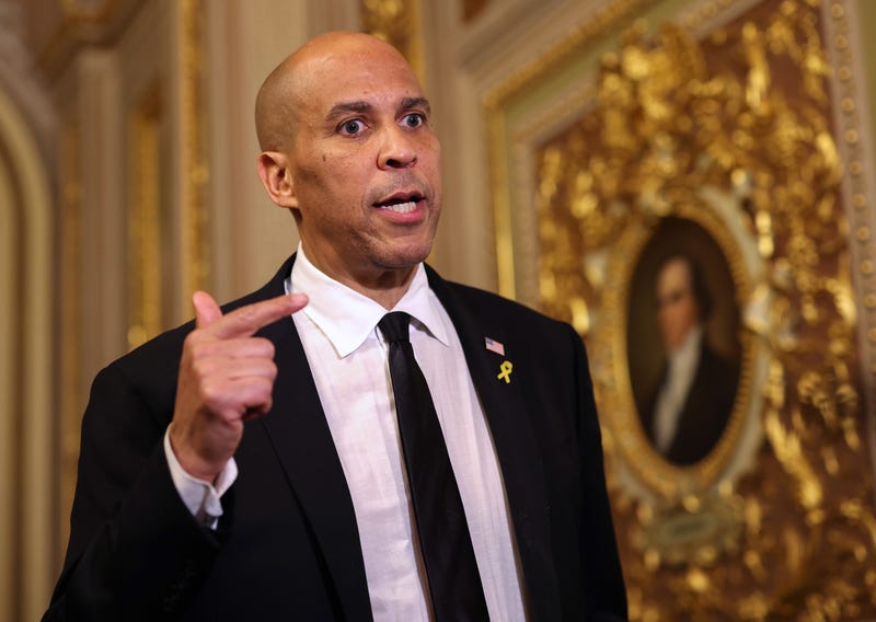 U.S. Sen. Cory Booker (D-NJ) speaks to reporters as he leaves the Senate Chamber after delivering a record setting floor speech at the U.S. Capitol on April 1, 2025