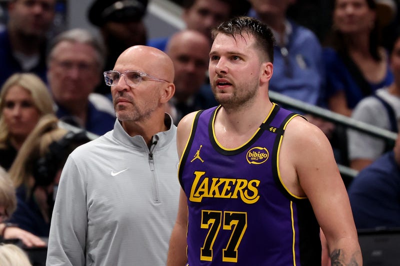 DALLAS, TEXAS - APRIL 09: Head coach Jason Kidd of the Dallas Mavericks and Luka Doncic #77 of the Los Angeles Lakers look on during the third quarter at American Airlines Center on April 09, 2025 in Dallas, Texas.
