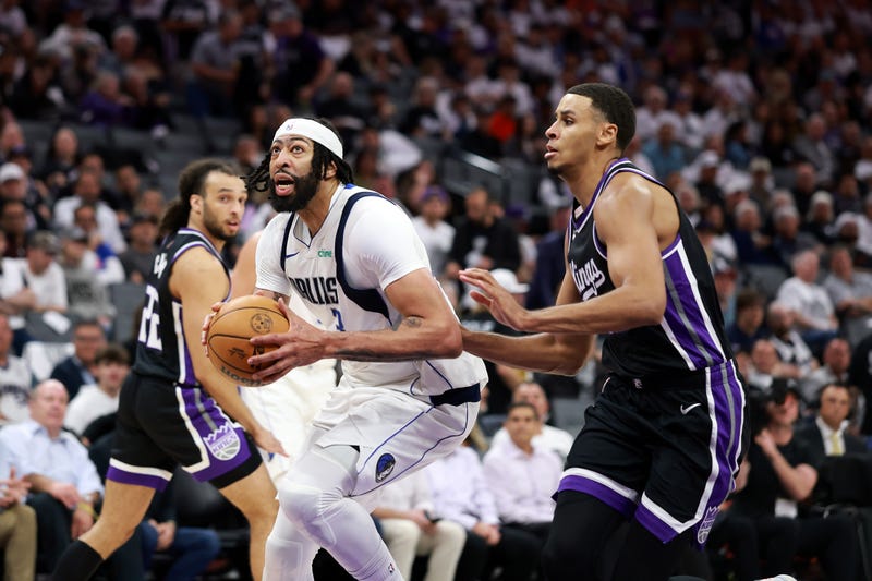 SACRAMENTO, CALIFORNIA - APRIL 16: Anthony Davis #3 of the Dallas Mavericks goes up for a shot on Keegan Murray #13 of the Sacramento Kings during the second half of the NBA play-in tournament game at Golden 1 Center on April 16, 2025 in Sacramento, California. (Photo by Ezra Shaw/Getty Images)