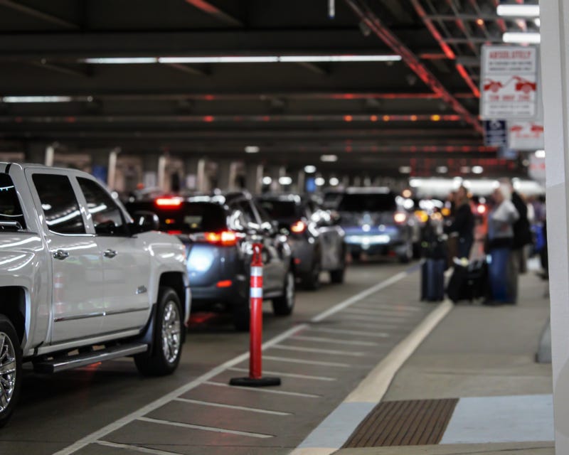 cars waiting in line at airport
