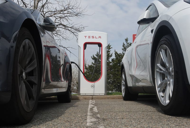 Tesla cars recharge their batteries at a Tesla charging station on April 19, 2025, in Elizabeth, New Jersey.