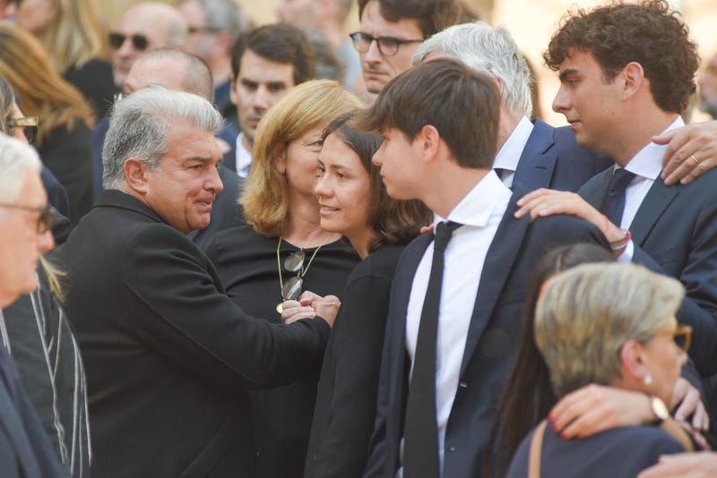 FC Barcelona president Joan Laporta greets family members as they leave the funeral at Sant Viçens de Sarria on April 22, 2025, in Barcelona, Spain