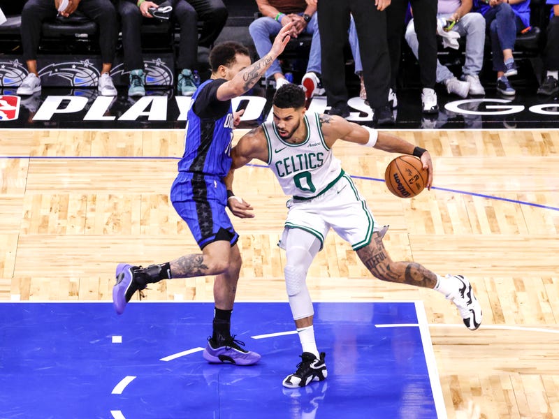 Jayson Tatum #0 of the Boston Celtics drives to the basket while being defended by Cole Anthony #50 of the Orlando Magic during the first half in Game 3 of the first round of the 2025 NBA Playoffs at the Kia Center on April 25, 2025 in Orlando, Florida. The Magic defeated the Celtics 95 to 93.