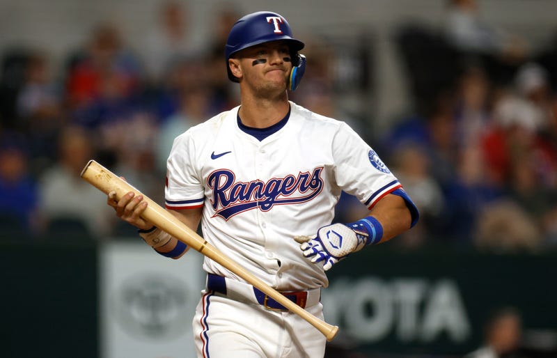 Josh Jung #6 of the Texas Rangers reacts after striking out against the Athletics during the first inning at Globe Life Field on April 29, 2025, in Arlington, Texas.