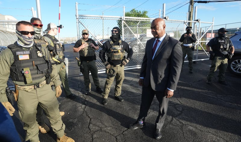 Mayor Ras Baraka of Newark confronts ICE agents at a demonstration outside an immigrant detention on May 7, 2025