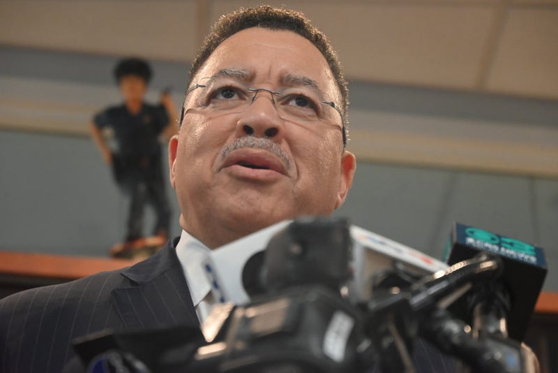 Police Commissioner Kevin Bethel speaks at a podium in May 2025.