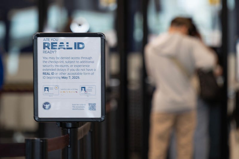 A passenger enters a security checkpoint where travelers who are not compliant with Real ID 