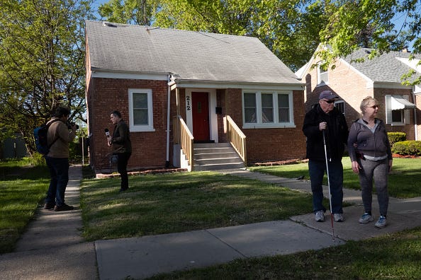 People visit the home where Cardinal Robert Prevost lived as a child on May 09, 2025 in Dolton, Illinois. Prevost, was named the first head of the Catholic Church from the United States and has taken the name Pope Leo XIV. (Photo by Scott Olson/Getty Images)