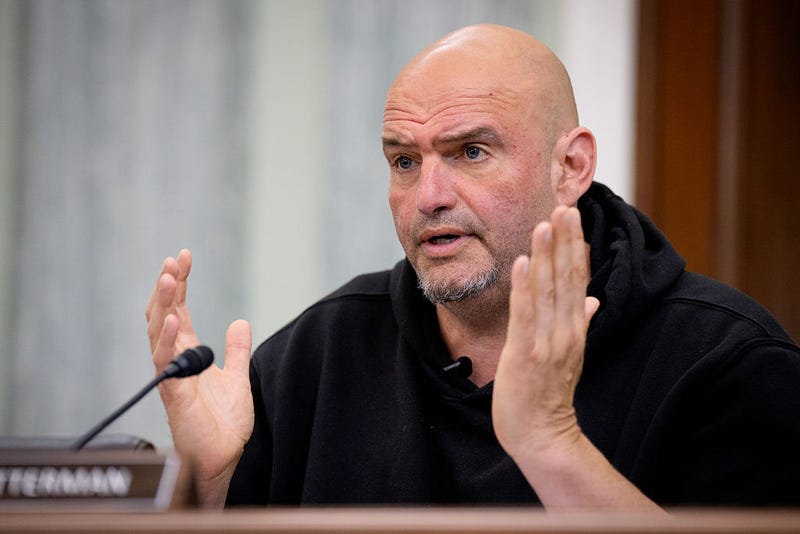 Sen. John Fetterman (D-PA) speaks during a Senate Transportation Committee hearing to examine FAA reauthorization and aviation safety on May 14, 2025 on Capitol Hill in Washington, DC. 