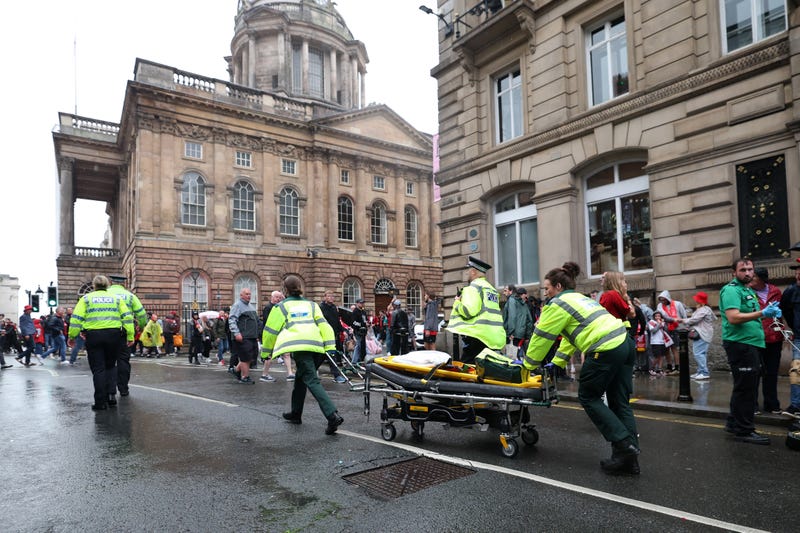 LIVERPOOL, ENGLAND - MAY 26: A large emergency service presence is pictured on Water Street after a car reportedly drives into the crowd during the Liverpool Trophy Parade on May 26, 2025 in Liverpool, England.